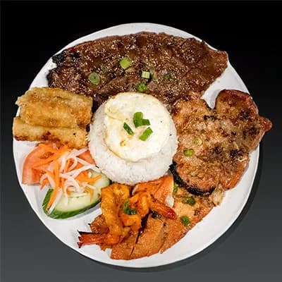 Grilled meat rice plate with vegetables at Pho 8