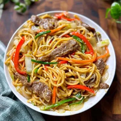 Lo mein noodles tossed with vegetables at Pho 8